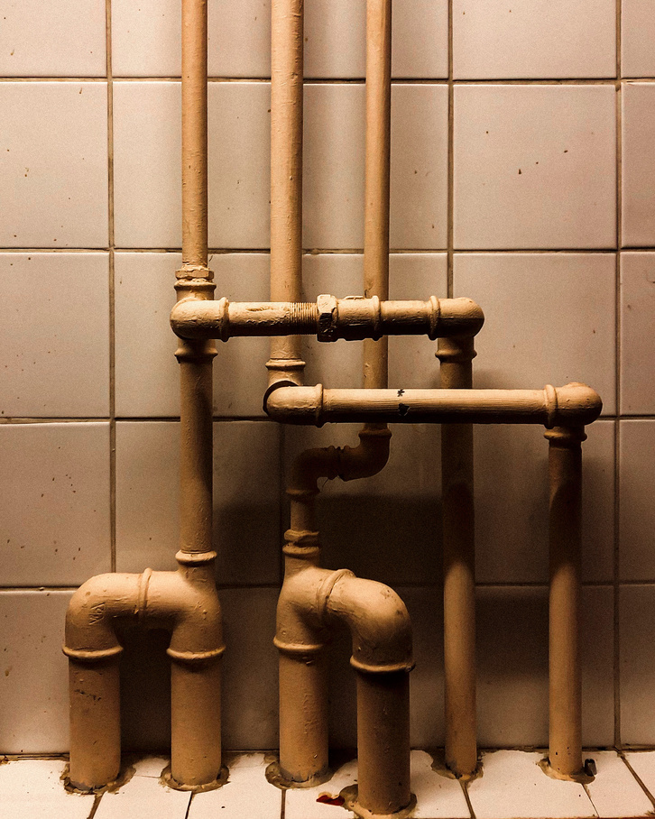 Brass Pipe With Water Droplets